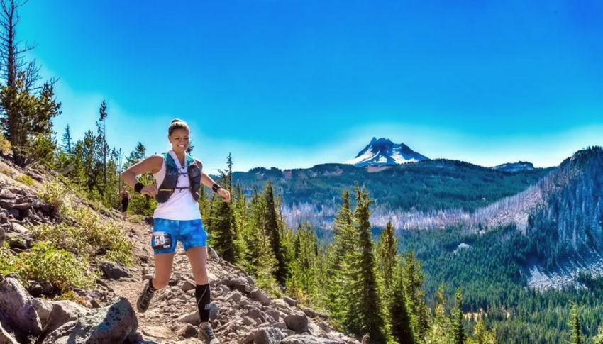 Sarah Cuff endurance athlete running through the mountains. My Matcha Life blog post on training your body to be more metabolically efficient.